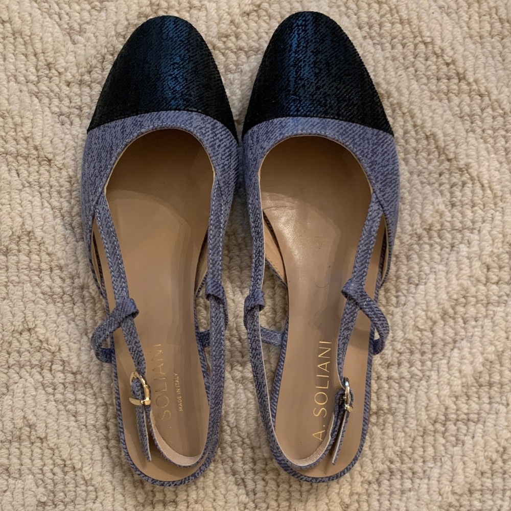 A. Soliani blue denim and black toe cap flats. 7.5